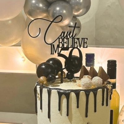 'Cant believe im 50' custom cake topper