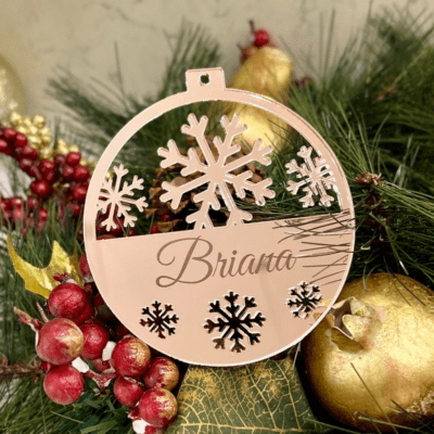 Personalised Christmas bauble engraved with snowflakes